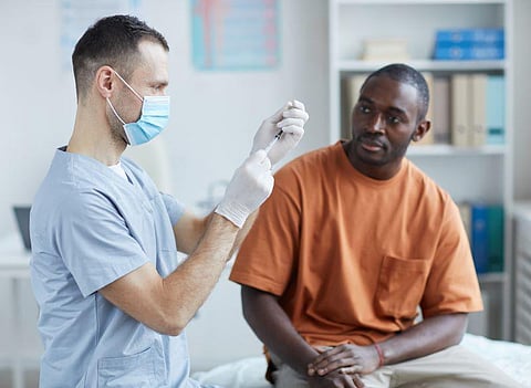 vaccine black man patient