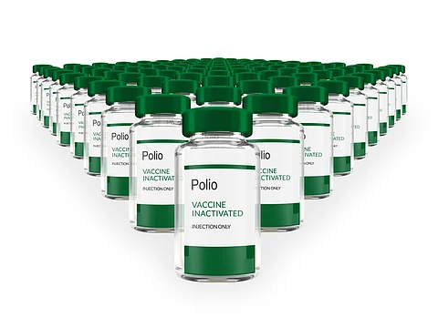 Rows of multiple Polio vaccine vials isolated on a white background. Mass production and industry concept. 3d rendering.