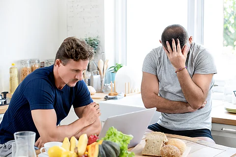 Gay male couple being angry with each other
