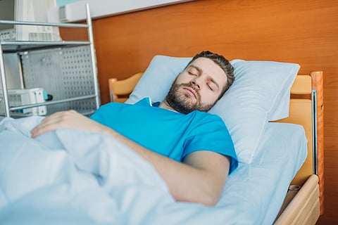 patient in hospital bed