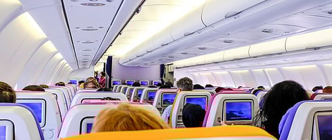 airplane passengers flying flight