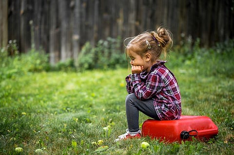 girl child autism sad