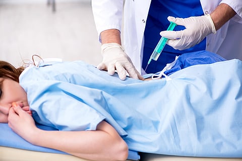 woman getting steroid shot for back pain backache steroids