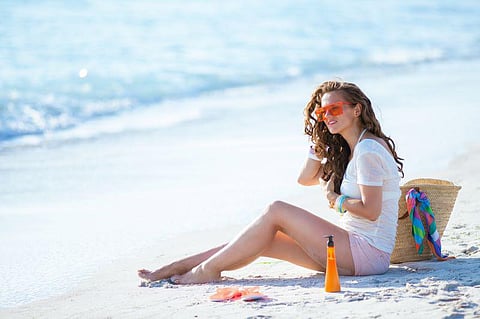 sunbathe tan beach tanning skin