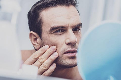skin self exam face mirror