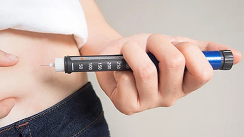 injecting insulin