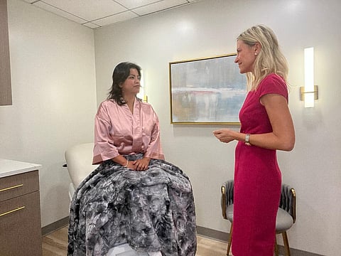 breast cancer doc with a patient