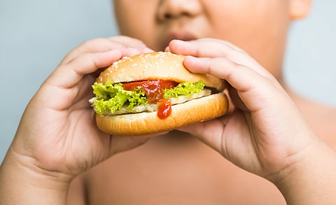child eating obese