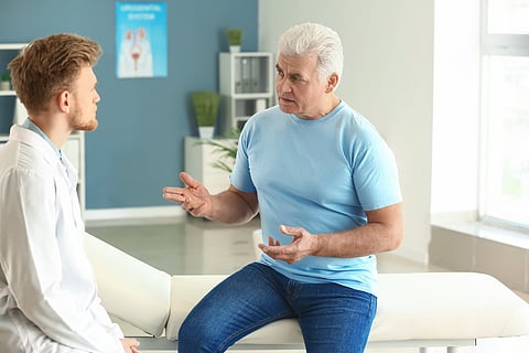 man in doctor's office with prostate problems