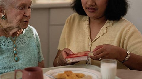 elderly woman and caregiver