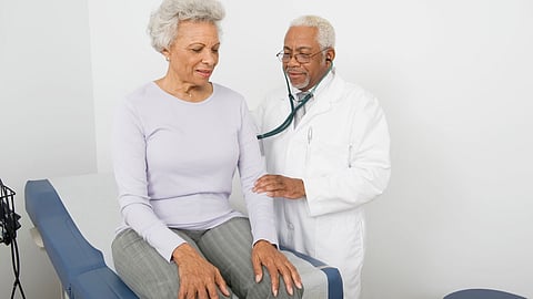 black senior woman lungs doctor