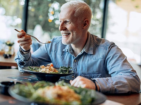 salad vegetarian man eating