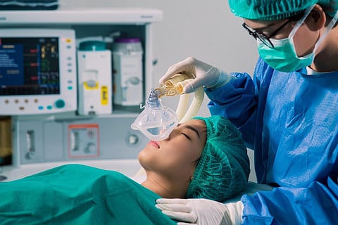person having surgery anesthesia
