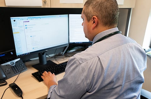 Dr. Harrison Jackson uses AI to help edit his patient appointment notes