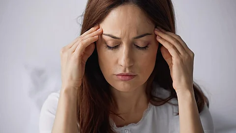 migraine woman headache pain