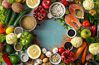 Top view frame of healthy and diet food (cereals, seeds, fish, vegetables and fruits). Healthy and diet menu of restaurant concept