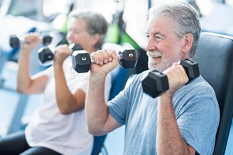 exercise seniors weight lifting