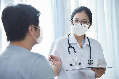 asian doctor patient