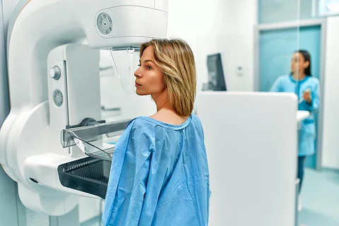 In the hospital, the patient undergoes a screening procedure for a mammogram, which is performed by a mammogram. A modern technologically advanced clinic with professional doctors.