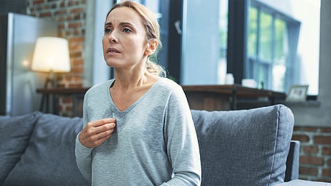 Woman having hot flash, menopause