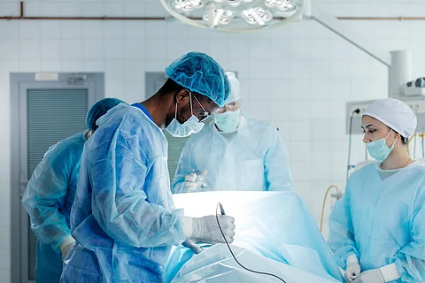 Black surgeon in surgery