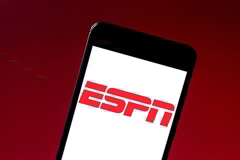 Ilustración: el logotipo de la Red de Programación de Entretenimiento y Deportes (ESPN) en un teléfono inteligente.