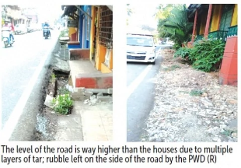 Rise in height of Abade Faria Road, open gutters & rubble plague residents