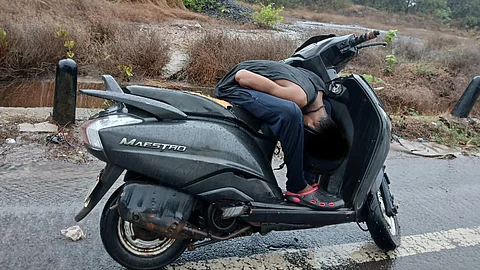 Man Found Unconscious on Bike Near Verna Bypass; Locals Struggle to Reach Emergency Services
