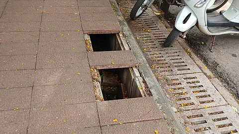 Broken Drain Covers Outside Panjim Post Office Pose Danger to Pedestrians