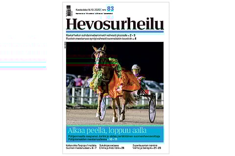 Joriini ja Hannu Hietanen pääsivät kuuntelemaan kansallislaulua PM-voittajina. Kannen kuva: Anu Leppänen