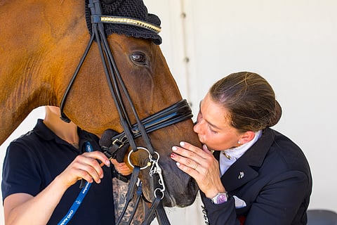 Cathrine Laudrup-Dufour ja MM-kultamitalihevonen Vamos Amigos.