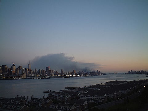 Smoke rising from World Trade Center. 11 September 2001. Photo: Wikimedia Commons.