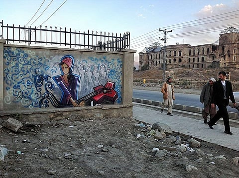 Graffiti at Darul Aman Palace, Kabul, Afghanistan, by Ommolbanin Shamsia Hassani. Photo: Wikimedia Commons