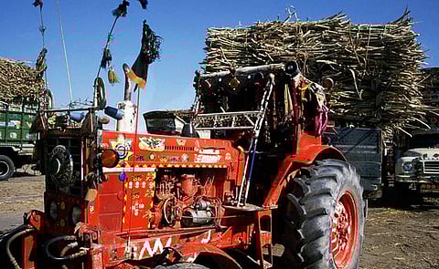 Mechanisation and middlemen: A customised tractor with a trailer full of harvested sugarcane, in Pakistan.
flickr / tpmartins