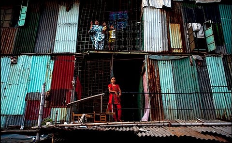 A slum apartment complex in Dhakaflickr/ Zoriah