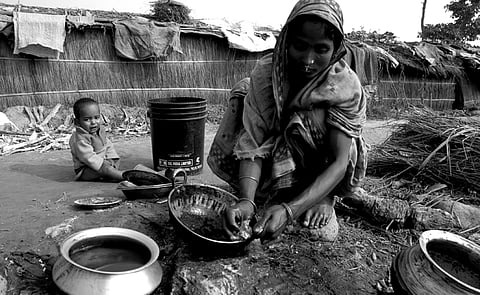 A Bengali-speaking Muslim woman and her child in Goroimari relief camp in Assam.
Photo: P K Das and Kazu Ahmed