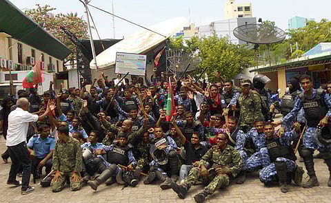 Mutinying security forces inside the MNBC compound.