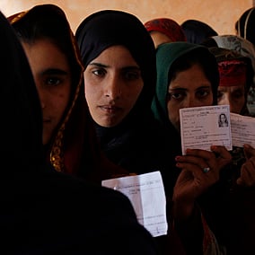 Female voters waiting in queue outside a polling booth in restive Lolab Valley.
Text by Saima Bhat and photos by Shahid Tantray.
