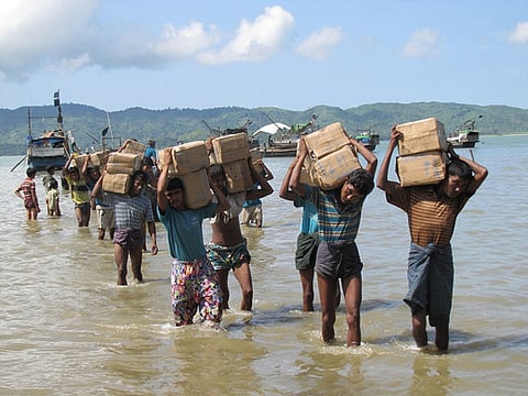 A camp for internally displaced people (IDP) near Sittwe. The camp can only be accessed by sea with boats for transporting vital aid supplies such as rice and cooking oil.