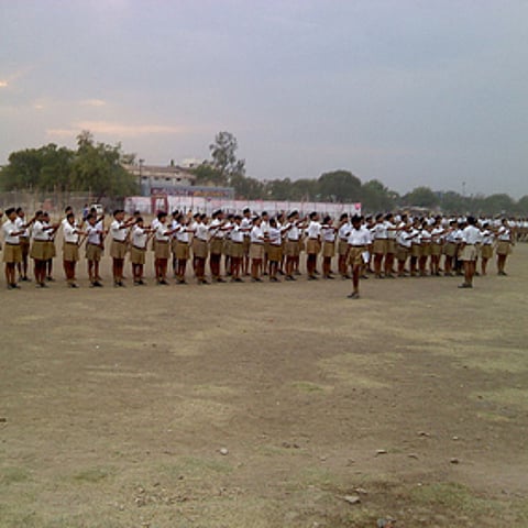 Rashtriya Swayamsewak Sangh (RSS) drill at Sangh headquarter Reshimbag Ground, Nagpur 
Photo : Wikimedia Commons / Ganesh Dhamodkar