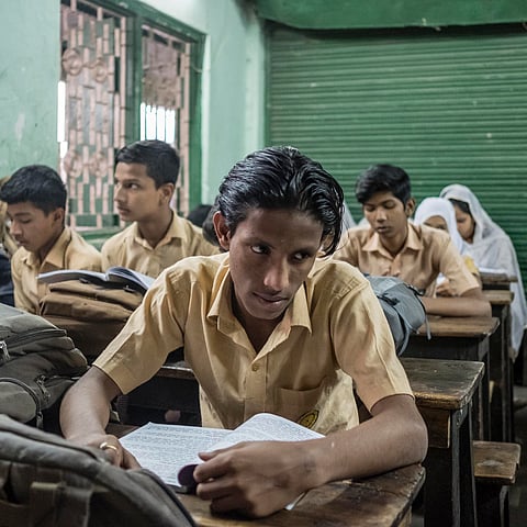 Geneva Camp, Dhaka, Bangladesh - A student during a lesson in the school’s camp.
There is only one and small school for the thousands children spreaded in the camp.