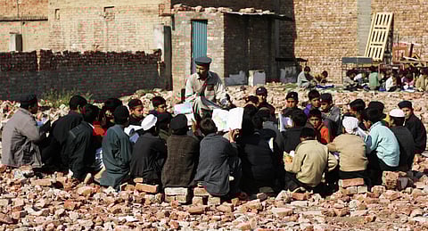 Demolished school In Mingora City, Swat, in November 2009 after army operation. Kashif Mardani/ Wikimedia Commons