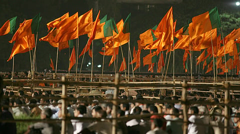 Photo: BJP and Shiv Sena flags. Al Jazeera English / Flickr
