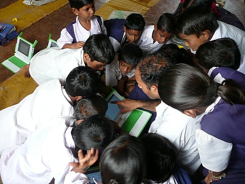 One Laptop per Child (OLPC) project at Khairat school, India. Photo: Wikimedia Commons.