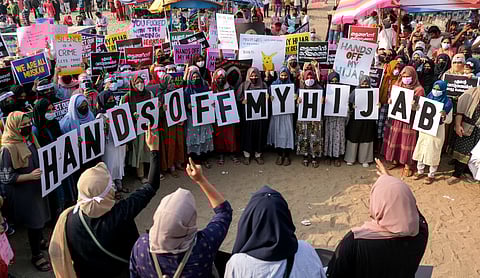 Muslim women from the Muslimah Collective protest against the ban on hijab in colleges in Karnataka. February 2022. Photo: ZUMA Wire / IMAGO.