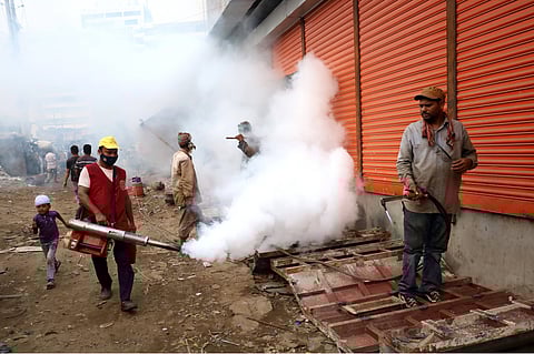 Workers of the Dhaka City Corporation spray pesticides to prevent dengue and other vector-borne diseases. As of 24 January 2023, over 60,000 dengue cases were reported across Bangladesh – the second-largest dengue outbreak in the country in 22 years. Photo courtesy: ZUMA Wire / IMAGO