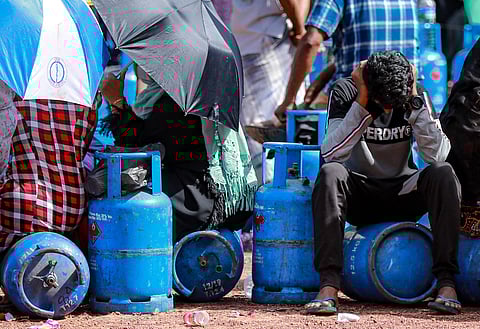 People queue to refill LPG in Colombo during shortages caused by Sri Lanka’s economic crisis. IMF recommendations are spurring austerity and economic devastation as the country sinks into a deep economic depression.