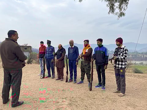 A training session for a village defence scheme in the village of Androla. Many of the members of this group have never used a weapon before, but a spate of violent attacks has renewed their desire to protect themselves. Photo courtesy: Auqib Javeed