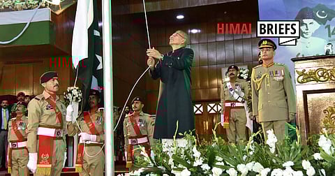 Pakistan President Arif Alvi hoists the national flag on 14 August 2023, the 76th anniversary of the country’s independence. With Pakistan’s parliament recently enacting two laws militarising the country in unprecedented ways, the president is a titular head of a state where all real power lies with an army while a civilian government is relegated to the position of junior partner. Photo: Xinhua / IMAGO
