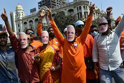 Bharatiya Janata Party supporters in West Bengal in 2021. Discourse and visuality played a key role in the politics of Narendra Modi, as is evident from a 2012 election campaign where he invited supporters to wear masks of his face, as if to say: “We are all Narendra Modi”. Photo: IMAGO / Pacific Press Agency.
